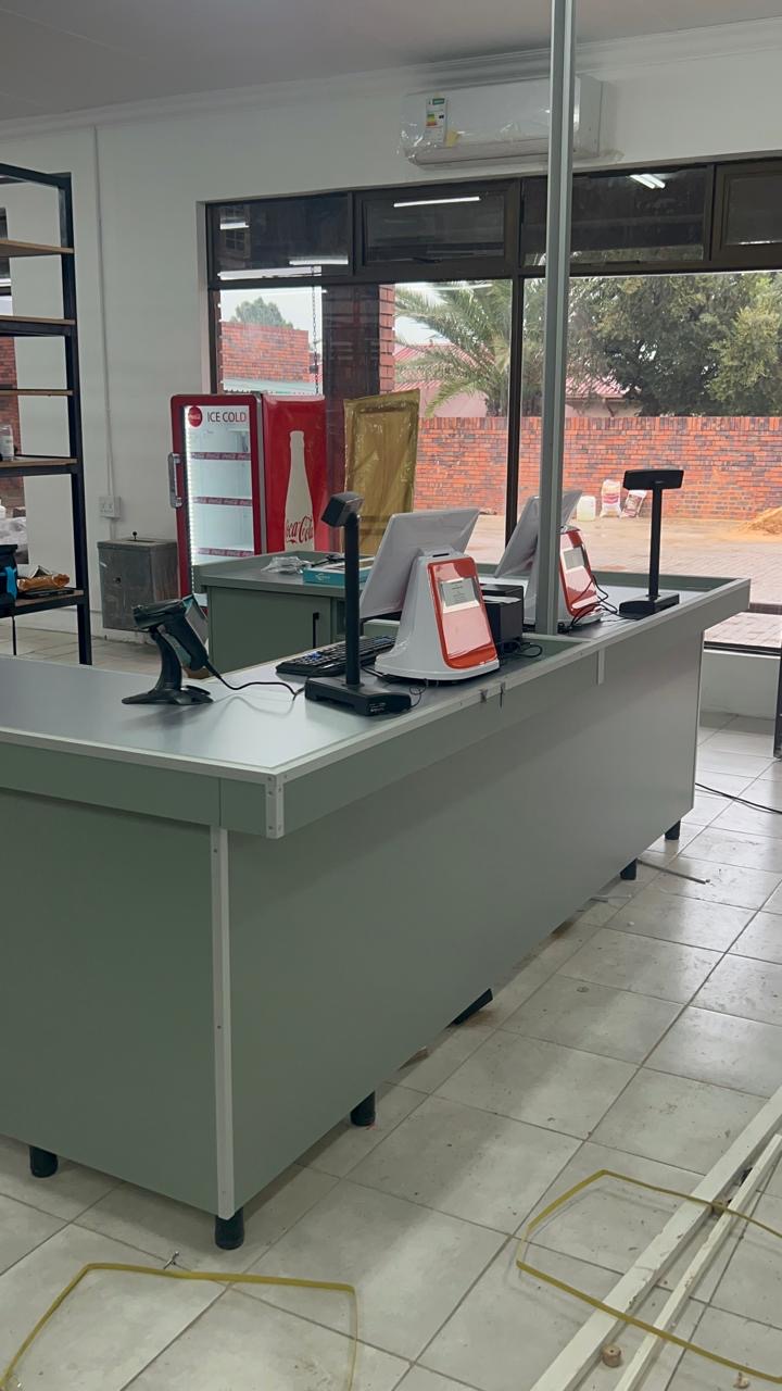 Point-of-sale stations installed at the community supermarket